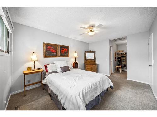 56 Hawkville Place Nw, Calgary, AB - Indoor Photo Showing Bedroom