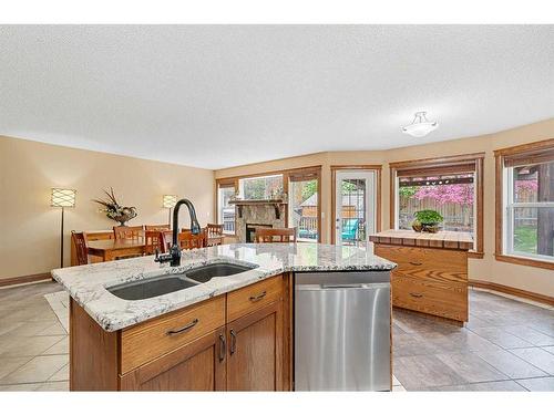 112 Hidden Ranch Close Nw, Calgary, AB - Indoor Photo Showing Kitchen With Double Sink