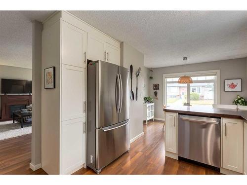 67 Midglen Way Se, Calgary, AB - Indoor Photo Showing Kitchen With Stainless Steel Kitchen