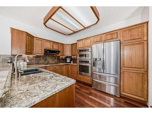 15880 Mckenzie Lake Way Se, Calgary, AB - Indoor Photo Showing Kitchen With Stainless Steel Kitchen With Double Sink