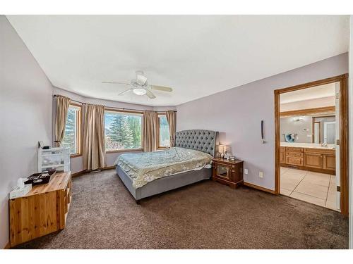 15880 Mckenzie Lake Way Se, Calgary, AB - Indoor Photo Showing Bedroom