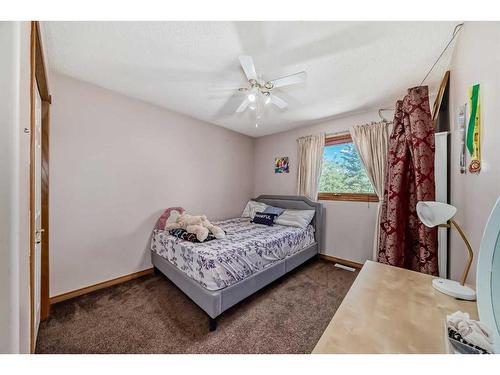 15880 Mckenzie Lake Way Se, Calgary, AB - Indoor Photo Showing Bedroom