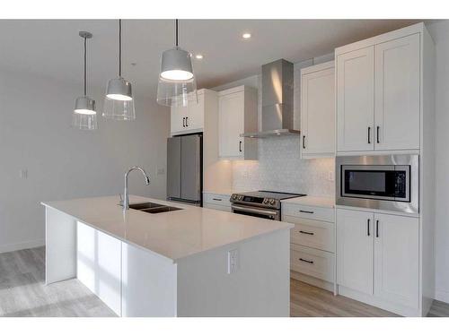 8206-1802 Mahogany Boulevard Se, Calgary, AB - Indoor Photo Showing Kitchen With Upgraded Kitchen