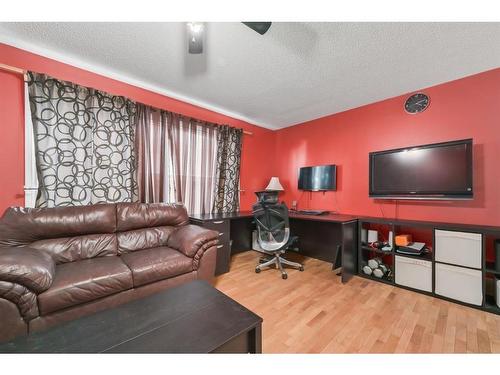 37 Midridge Green Se, Calgary, AB - Indoor Photo Showing Living Room