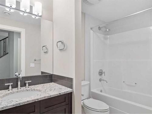 14 West Grove Point Sw, Calgary, AB - Indoor Photo Showing Bathroom
