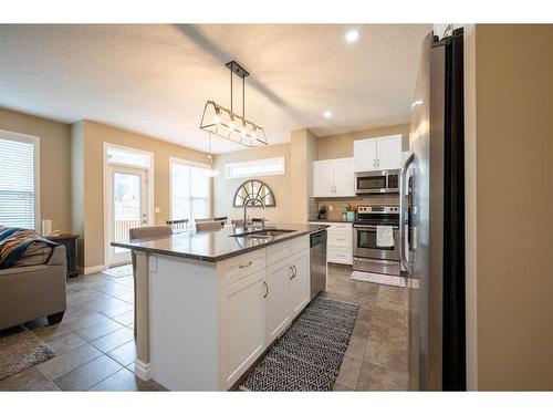 197 Cranarch Crescent Se, Calgary, AB - Indoor Photo Showing Kitchen With Double Sink