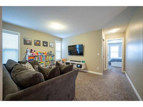 197 Cranarch Crescent Se, Calgary, AB - Indoor Photo Showing Living Room