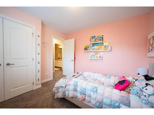 197 Cranarch Crescent Se, Calgary, AB - Indoor Photo Showing Bedroom
