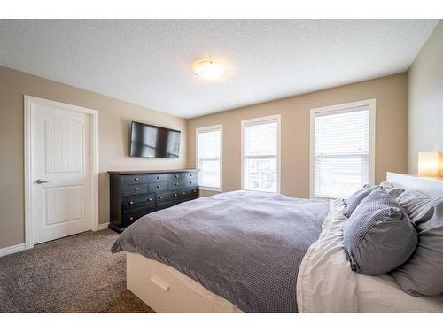 197 Cranarch Crescent Se, Calgary, AB - Indoor Photo Showing Bedroom