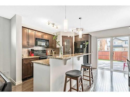 524 Cranston Drive Se, Calgary, AB - Indoor Photo Showing Kitchen With Upgraded Kitchen