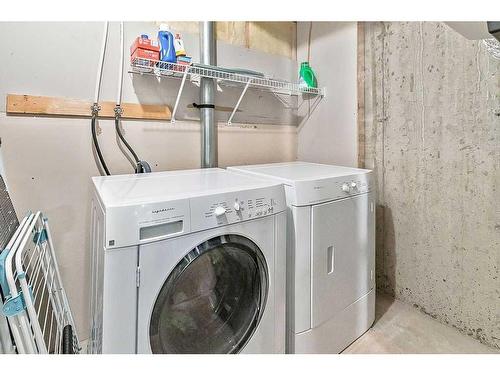 524 Cranston Drive Se, Calgary, AB - Indoor Photo Showing Laundry Room