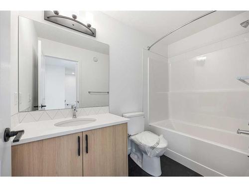 107 Heirloom Drive Se, Calgary, AB - Indoor Photo Showing Bathroom