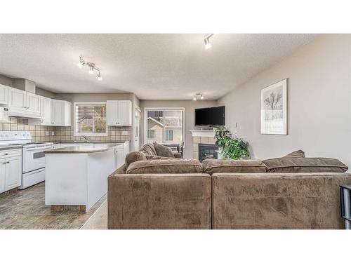 22 Royal Oak Gardens Nw, Calgary, AB - Indoor With Fireplace
