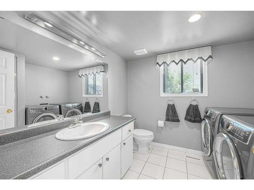 168 Coachwood Crescent Sw, Calgary, AB - Indoor Photo Showing Laundry Room