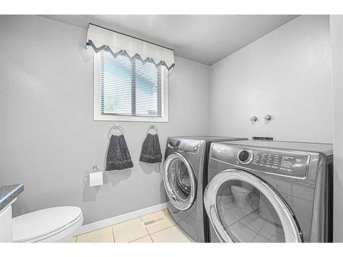 168 Coachwood Crescent Sw, Calgary, AB - Indoor Photo Showing Laundry Room