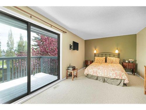 168 Coachwood Crescent Sw, Calgary, AB - Indoor Photo Showing Bedroom