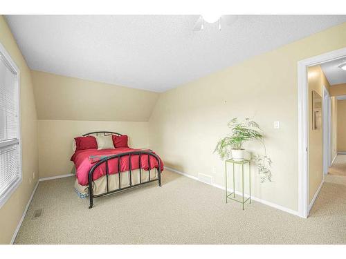 168 Coachwood Crescent Sw, Calgary, AB - Indoor Photo Showing Bedroom