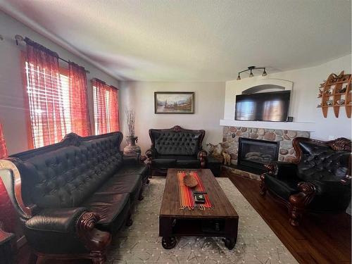 160 Somerglen Common Sw, Calgary, AB - Indoor Photo Showing Living Room With Fireplace