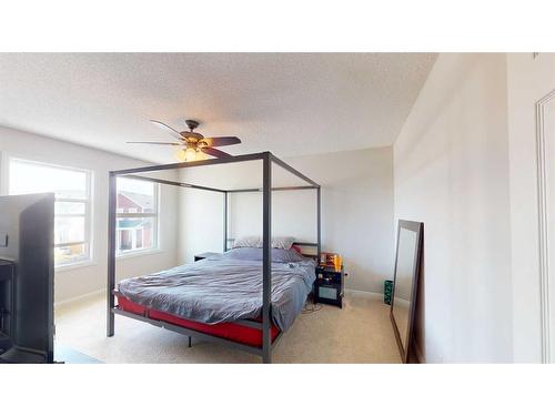94 Copperleaf Terrace Se, Calgary, AB - Indoor Photo Showing Bedroom