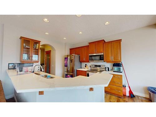 94 Copperleaf Terrace Se, Calgary, AB - Indoor Photo Showing Kitchen With Double Sink