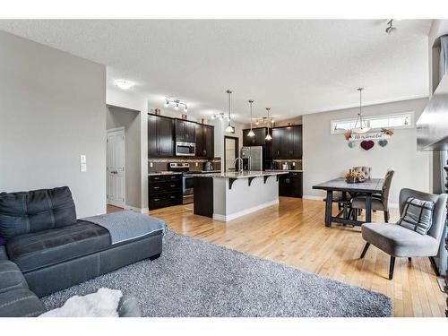 12 Cranberry Gardens Se, Calgary, AB - Indoor Photo Showing Living Room