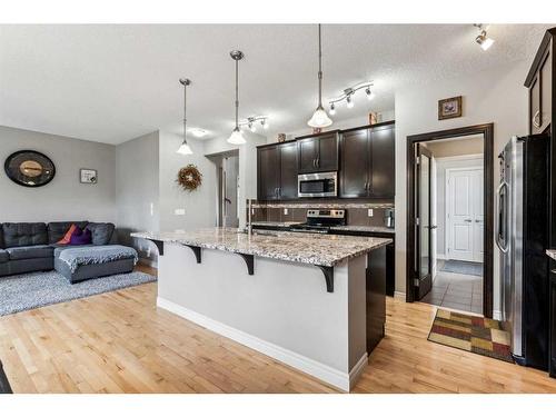 12 Cranberry Gardens Se, Calgary, AB - Indoor Photo Showing Kitchen With Upgraded Kitchen