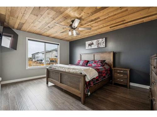 149 Heritage Boulevard West, Cochrane, AB - Indoor Photo Showing Bedroom