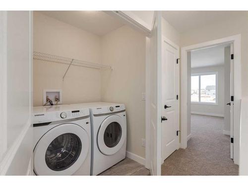 238 South Shore Court Court, Chestermere, AB - Indoor Photo Showing Laundry Room