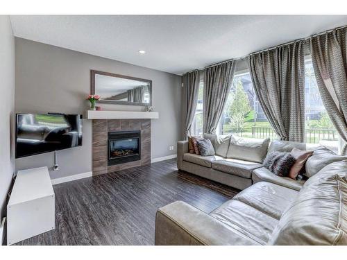 68 Nolanlake Point Nw, Calgary, AB - Indoor Photo Showing Living Room With Fireplace
