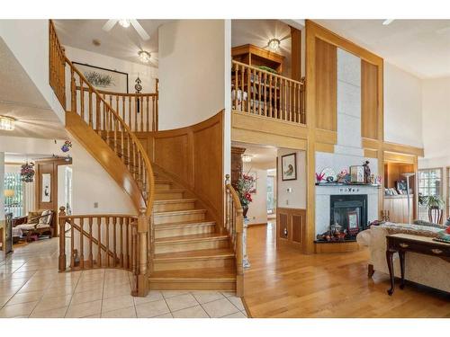 139 Woodacres Drive Sw, Calgary, AB - Indoor Photo Showing Other Room With Fireplace