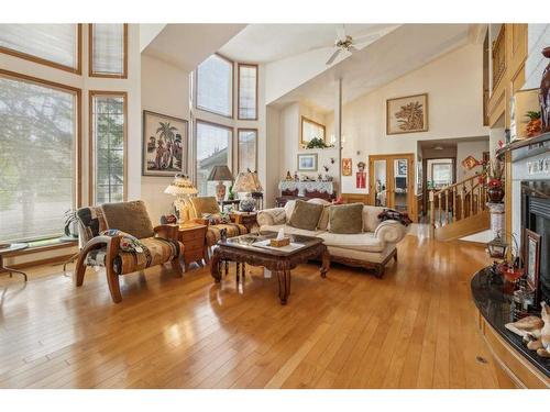 139 Woodacres Drive Sw, Calgary, AB - Indoor Photo Showing Living Room With Fireplace