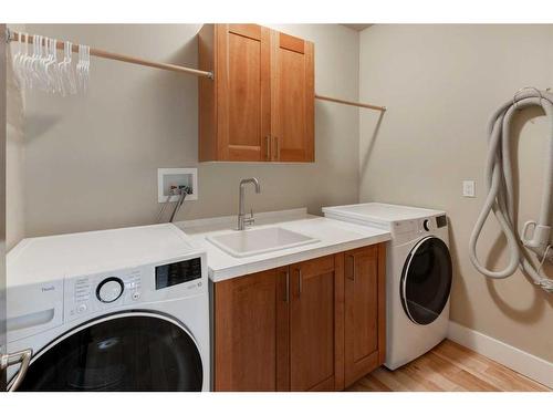 5827 Bow Crescent Nw, Calgary, AB - Indoor Photo Showing Laundry Room