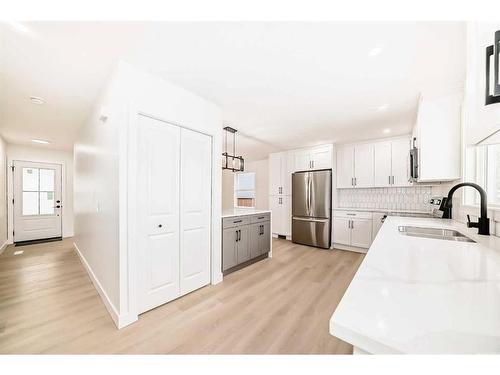 6739 3 Avenue Se, Calgary, AB - Indoor Photo Showing Kitchen With Stainless Steel Kitchen With Double Sink