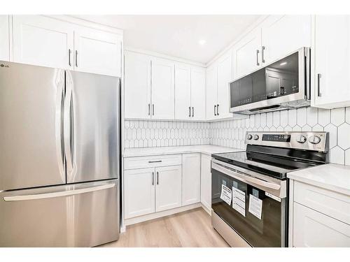 6739 3 Avenue Se, Calgary, AB - Indoor Photo Showing Kitchen With Stainless Steel Kitchen