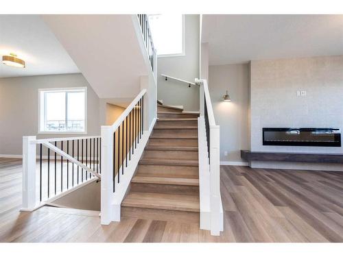 1327 Cornerstone Street, Calgary, AB - Indoor Photo Showing Other Room With Fireplace