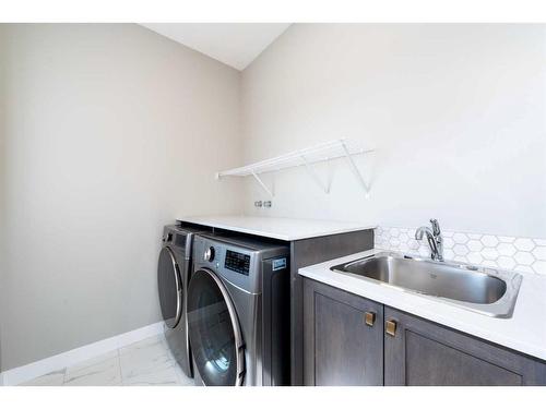 1327 Cornerstone Street, Calgary, AB - Indoor Photo Showing Laundry Room