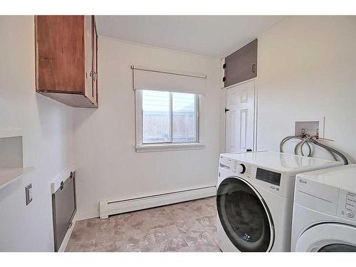 8631 48 Avenue Nw, Calgary, AB - Indoor Photo Showing Laundry Room