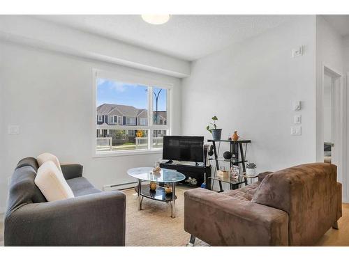 115-40 Carrington Plaza Nw, Calgary, AB - Indoor Photo Showing Living Room