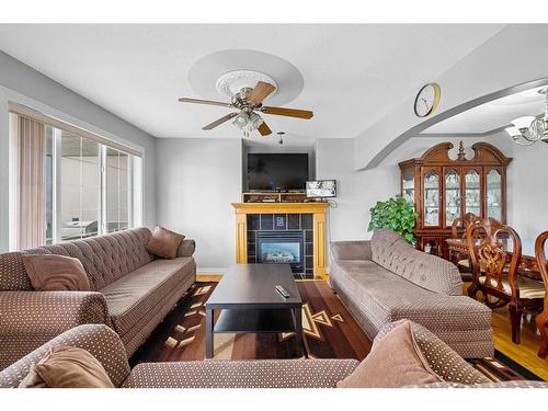 169 Tarawood Place Ne, Calgary, AB - Indoor Photo Showing Living Room With Fireplace