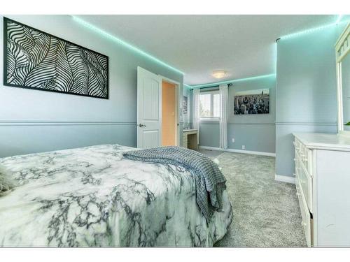 692 West Chestermere Drive, Chestermere, AB - Indoor Photo Showing Bedroom