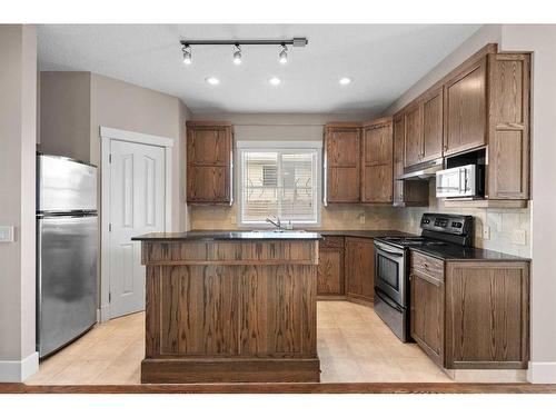 2709 14 Avenue Se, Calgary, AB - Indoor Photo Showing Kitchen With Stainless Steel Kitchen
