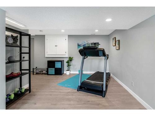 172 Brabourne Road Sw, Calgary, AB - Indoor Photo Showing Gym Room