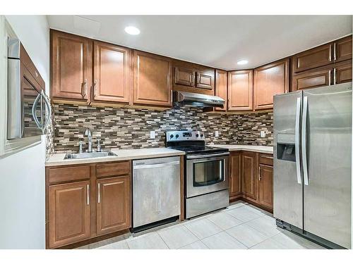 95 Mahogany Grove Se, Calgary, AB - Indoor Photo Showing Kitchen With Upgraded Kitchen