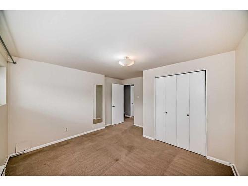 48 Hooke Road Sw, Calgary, AB - Indoor Photo Showing Other Room