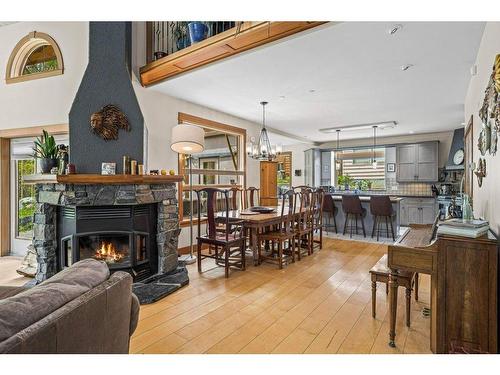 265 Three Sister Drive Se, Canmore, AB - Indoor Photo Showing Living Room With Fireplace