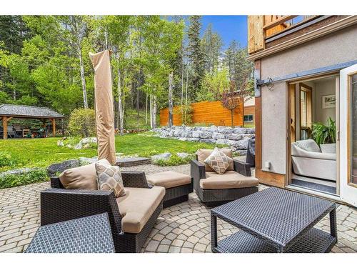 265 Three Sister Drive Se, Canmore, AB - Outdoor With Deck Patio Veranda With Exterior