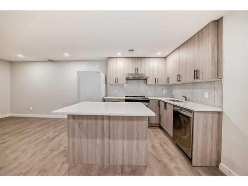 404 Lucas Boulevard Nw, Calgary, AB - Indoor Photo Showing Kitchen With Stainless Steel Kitchen