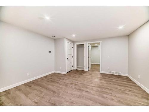 404 Lucas Boulevard Nw, Calgary, AB - Indoor Photo Showing Other Room