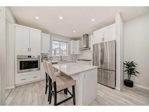 404 Lucas Boulevard Nw, Calgary, AB - Indoor Photo Showing Kitchen With Stainless Steel Kitchen With Upgraded Kitchen