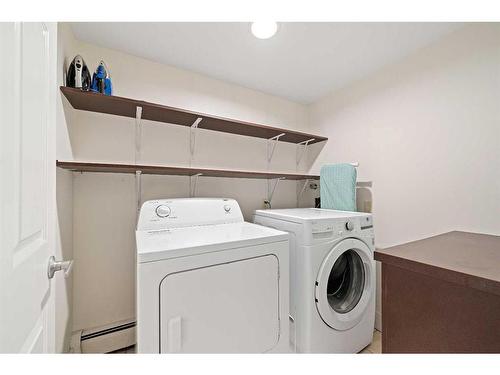 104-350 4 Avenue Ne, Calgary, AB - Indoor Photo Showing Laundry Room